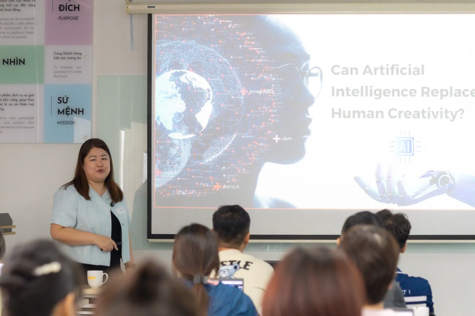 Ashley presenting to a class